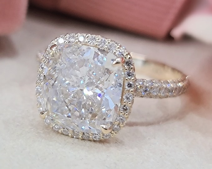 This unique double edge halo 14K gold diamond setting features a 3 carat IGI certified CVD lab grown cushion cut diamond & 0.75 carats accent diamonds