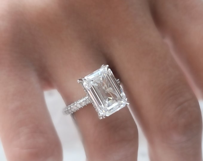 This dainty elegant pave diamond setting features a 6 carat IGI certified CVD lab grown emerald cut diamond & 0.75 carats accent diamonds