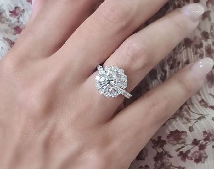 2.50ct Round Cut IGI Certified CVD lab grown center diamond surrounded by a  1.20ct unique diamond halo and diamond band setting