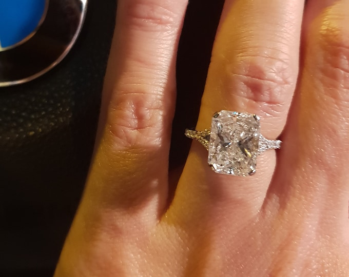 This Elegant Split Shank diamond setting features a 4 carat IGI Certified CVD lab grown elongated Radiant cut diamond