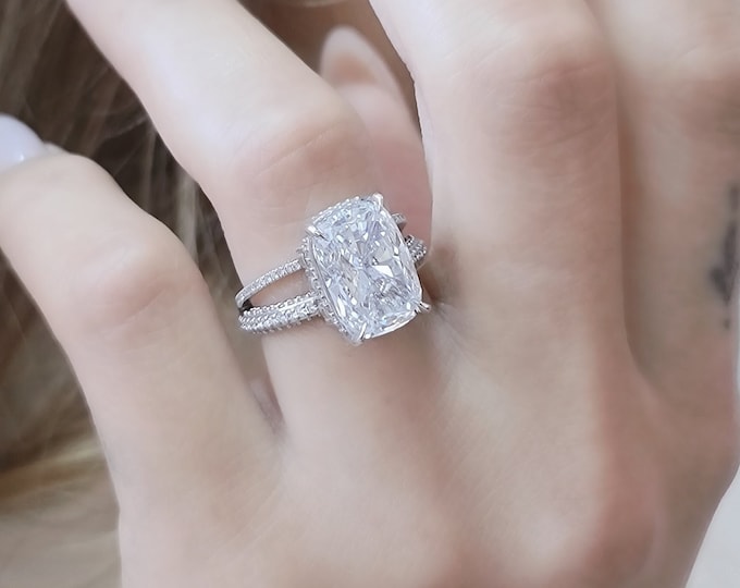 This unique split shank micro pave diamond set band features a 5 carat IGI Certified CVD lab grown cushion cut diamond & 1.30 carats side diamonds