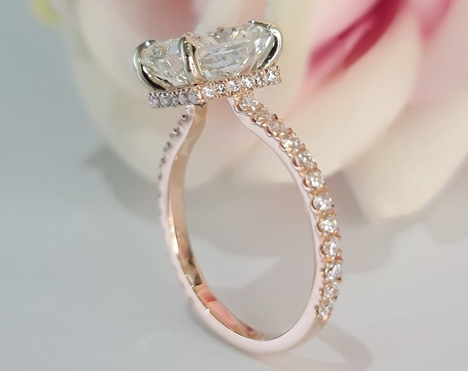 This 14k Rose Gold Unique invisible gallery and hidden halo diamond setting features a 2.5ct Carat Radiant Cut IGI Certified CVD lab grown diamond