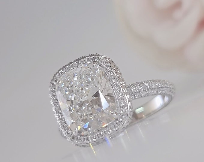 This unique double edge halo 14K gold diamond setting features a 3.5 carat IGI certified CVD lab grown cushion cut diamond & 1 carats accent diamonds