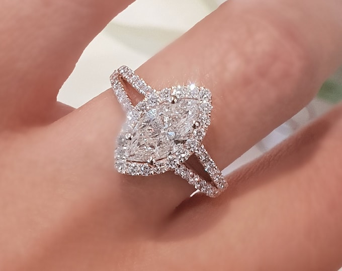 This unique Victorian style diamond split shank & halo 14K rose gold setting features a 2 carat IGI certified CVD lab grown marquise cut diamond