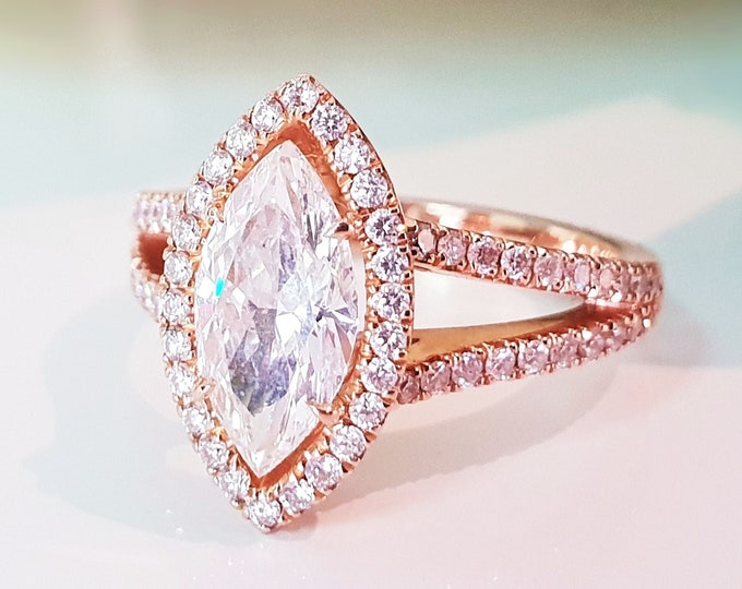 This unique Victorian style diamond split shank & halo 14K rose gold setting features a 2 carat IGI certified CVD lab grown marquise cut diamond