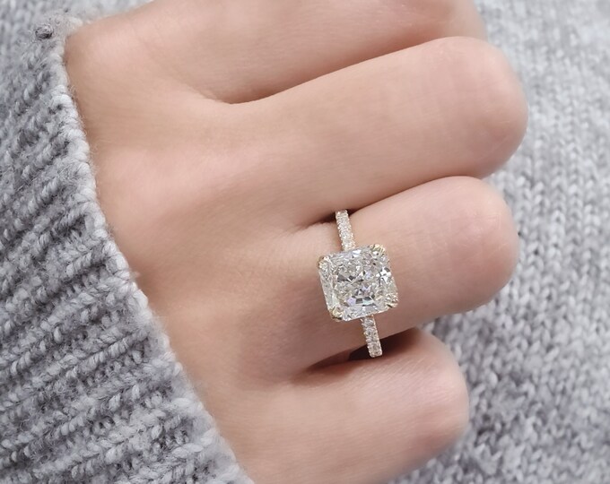 Stunning 2 Carat IGI Certified CVD lab grown Radiant Cut diamond set in a unique invisible gallery with hidden halo and diamond pave setting