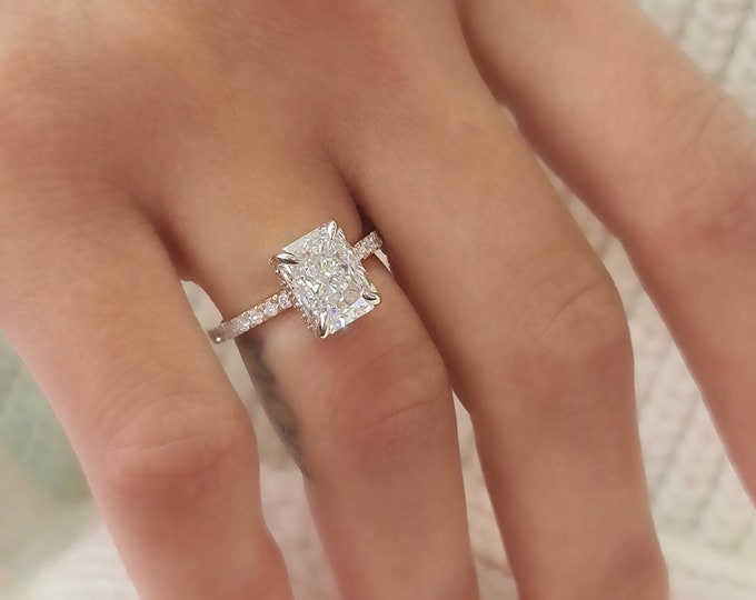 This 14k Rose Gold Unique invisible gallery and hidden halo diamond setting features a 2.5ct Carat Radiant Cut IGI Certified CVD lab grown diamond