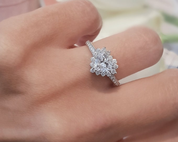 This dazzling heart shaped halo diamond setting features a 1.10 carat Heart cut IGI Certified CVD lab grown diamond surrounded by 0.40ct accent diamonds