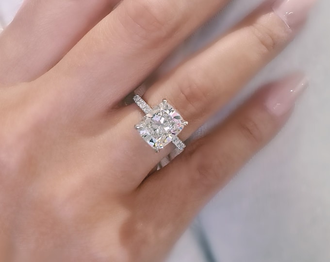 This classic pave diamond set band features a 4 carat IGI Certified CVD lab grown cushion cut diamond & 0.45 carats side diamonds