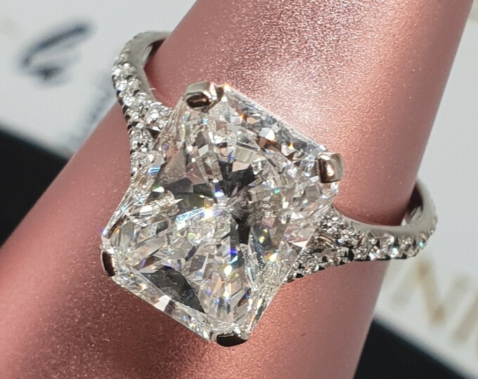This Elegant Split Shank diamond setting features a 4 carat IGI Certified CVD lab grown elongated Radiant cut diamond