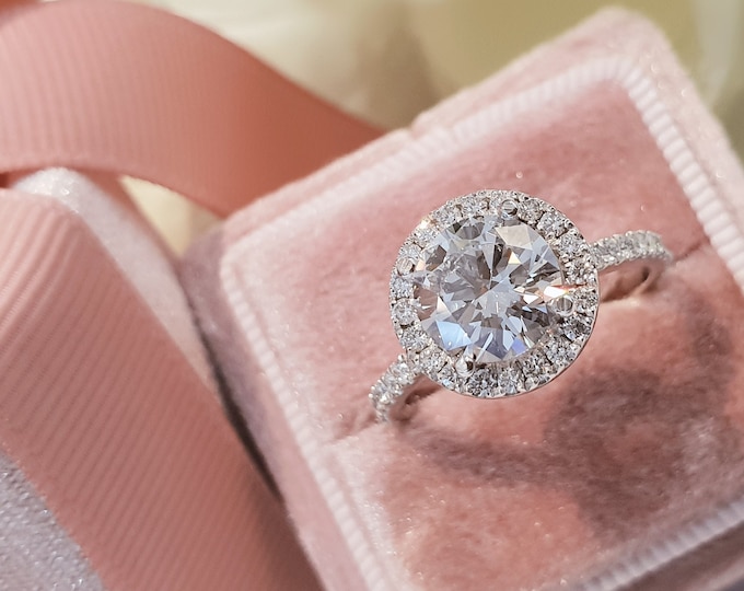 14K white gold high profile halo diamond setting with 2ct center round brilliant cut IGI certified CVD lab grown diamond and 0.65ct accent diamonds
