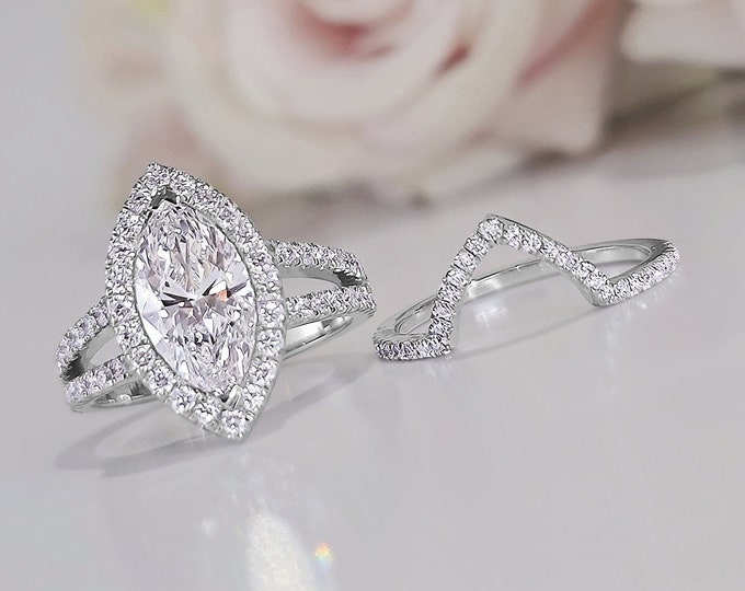 This unique Victorian style diamond split shank & halo 14K rose gold setting features a 1.50 carat IGI certified CVD lab grown marquise cut diamond and 0.65 carats accent diamonds
