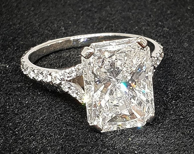 This Elegant Split Shank diamond setting features a 5 carat IGI Certified CVD lab grown elongated Radiant cut diamond