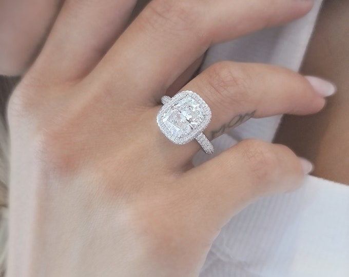 This unique double edge halo 14K gold diamond setting features a 3.5 carat IGI certified CVD lab grown cushion cut diamond & 1 carats accent diamonds