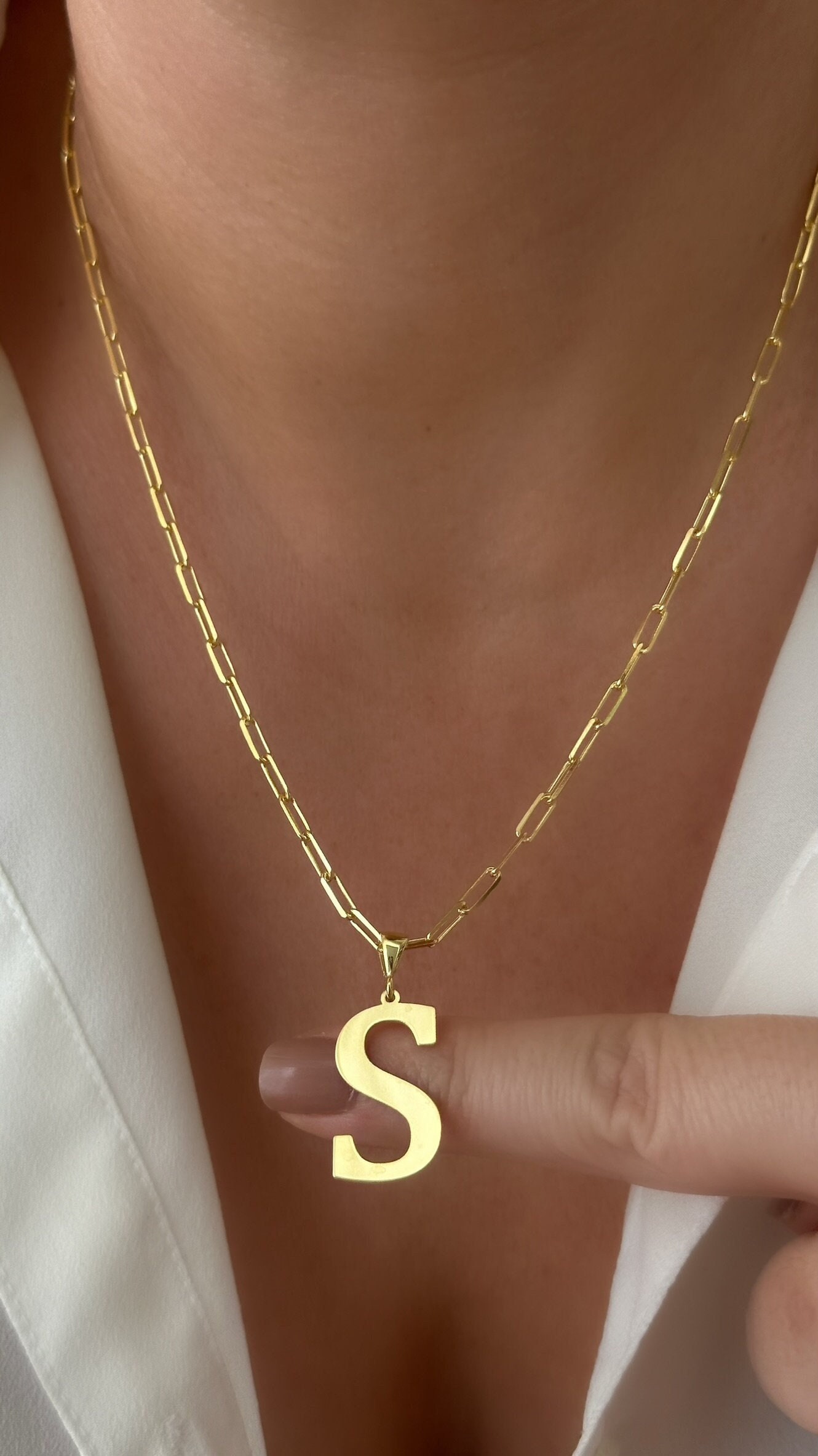 Large initial charms store