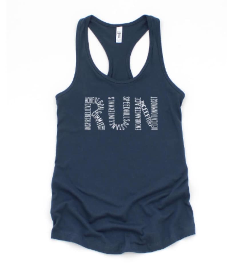 May include: A navy blue tank top with the word "RUN" spelled out in white lettering. The letters are made up of words related to running, such as "achieve", "inspire", "believe", "strength", "endurance", and "dedication".