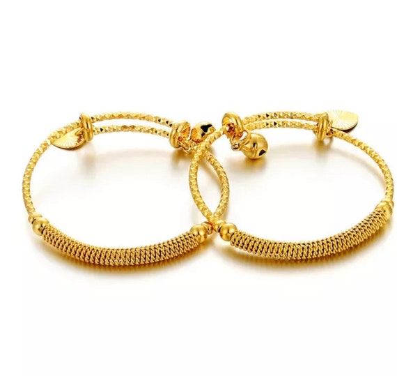 Spring bangles hotsell gold