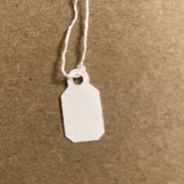 100 String Tags for Jewelry. 3/8" x 13/16"  White tag with white string.       stsc