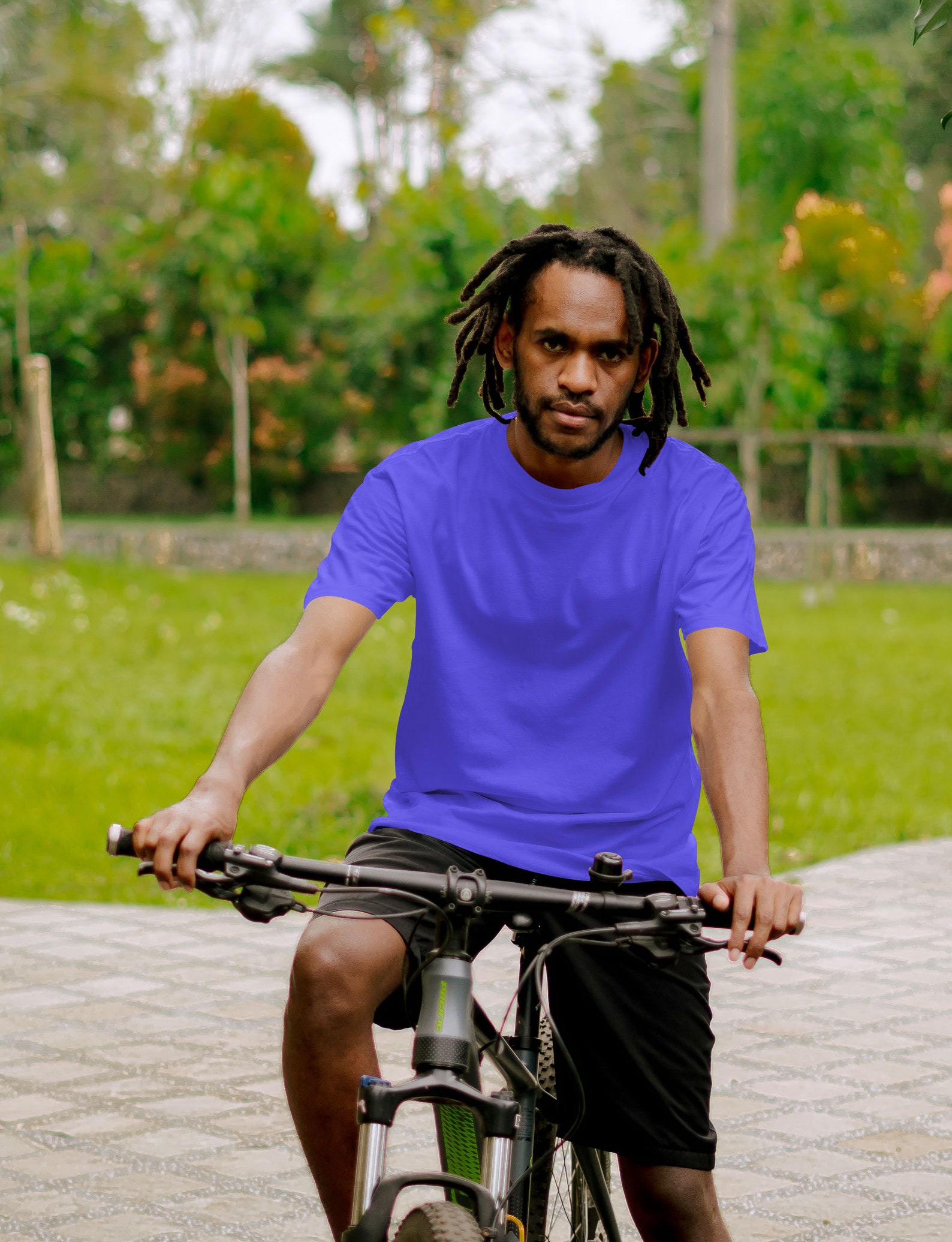 Download A Yellow Shirt Mockup Template With the Model Riding a ...