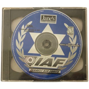 Op de afbeelding: Een blauwe en zilveren CD-ROM met de tekst "IAF Israeli Air Force" en "IAF 50th Anniversary CD". De schijf zit in een doorzichtige plastic hoes.