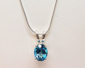 Ladies 10x8mm Oval Blue Topaz Sterling Silver Chain+Pendent