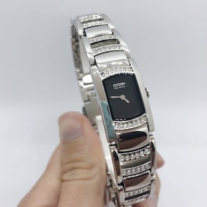 Silhouette Wrist Watch with Swarovski Crystal and Black and Silver Detail