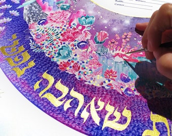 May include: A colorful ketubah with a purple, pink, and blue background. The ketubah features a gold Hebrew inscription and a watercolor illustration of a peacock, flowers, and stars. The text on the ketubah reads "Bride, Witness, Rabbi Cantor, Groom, Witness".