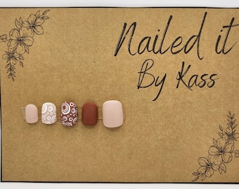 Short square brown and tan gel press on nails with accent design made in customized shape and size. 10 nails included.