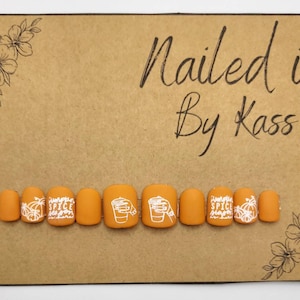 Short square orange pumpkin spice gel press on nails.