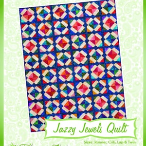 May include: A quilt pattern called "Jazzy Jewels Quilt" by Fairy Lake Quilt Designs. The quilt is made with colorful fabric squares in shades of red, pink, blue, green, and white. The quilt is designed to be made in various sizes, including runner, crib, lap, and twin.