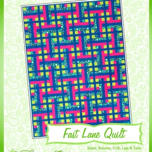 May include: A quilt pattern called "Fast Lane Quilt" with a blue background and pink and yellow squares. The pattern is from Fairy Lake Quilt Designs, a company that specializes in "Fun & Done! Quilting".
