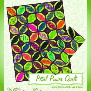 May include: A quilt pattern titled Petal Power Quilt by Fairy Lake Quilt Designs, featuring a dark purple background with vibrant, multi-colored petal shapes in neon green, pink, orange, and blue. The text includes Fun & Done! Quilting.