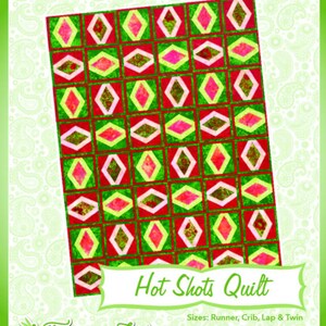 May include: A quilt pattern called "Hot Shots Quilt" with a red, green and pink diamond pattern. The pattern is from Fairy Lake Quilt Designs, a company that specialises in "Fun & Done! Quilting".