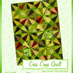 May include: A quilt pattern called "Criss Cross Quilt" with a green, brown, and yellow colour scheme. The pattern is made up of squares and triangles. The quilt is shown on a white background with a green paisley pattern. The text "Fun & Done! Quilting" is at the top of the image. The text "Fairy Lake Quilt Designs" is at the bottom of the image.