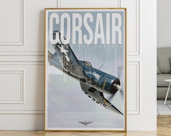 May include: A framed poster featuring a Vought F4U Corsair aircraft in flight. The poster has a gold frame and displays the word "CORSAIR" in large white letters. The aircraft is dark blue with a white star on its wing.