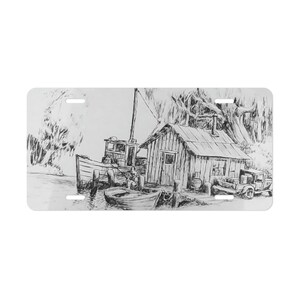 May include: A black and white pen and ink drawing of a small wooden shack on a dock with a boat tied to the dock. There is a truck parked on the dock and trees in the background.