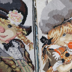 Set of two Poulbot canvases on a light background