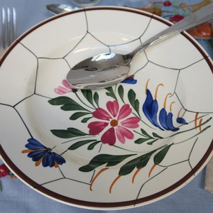 Set of five ceramic soup plates from St AMAND, Maurice model