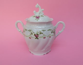 Sucrier ancien en porcelaine à décor de roses
