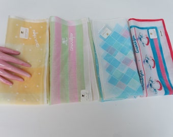 Large handkerchiefs signed Courrèges, possible use as a mini scarf, sold individually