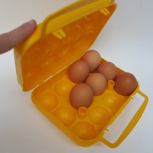 Yellow plastic egg box