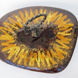 Vintage ceramic cheese board and wrought iron ring