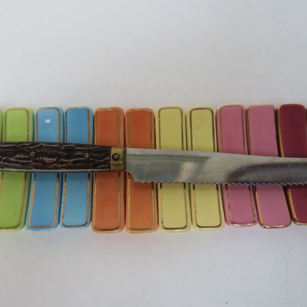 Lot de 12 portes couteaux en céramique multicolores