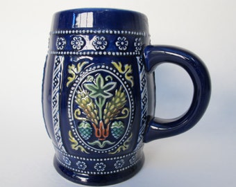 Blue glazed stoneware beer mug