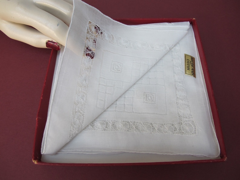 Two old handkerchiefs embroidered white cotton hands in their original box