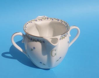 Limoges porcelain gravy boat with barbel decoration