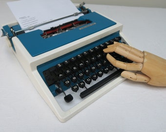 Machine à écrire UNDERWOOD 315 bleue, merci de bien lire l'annonce