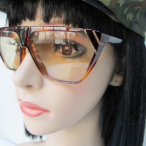 Pair of Modylook Paris sunglasses, made in France, unisex
