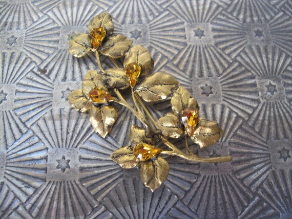 Large gold metal brooch, flower stem - image 8