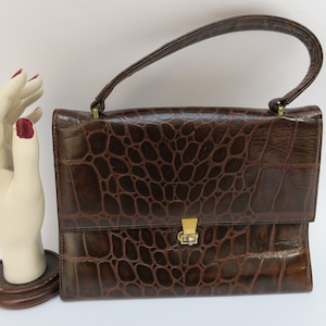Old crocodile imitation vinyl bag